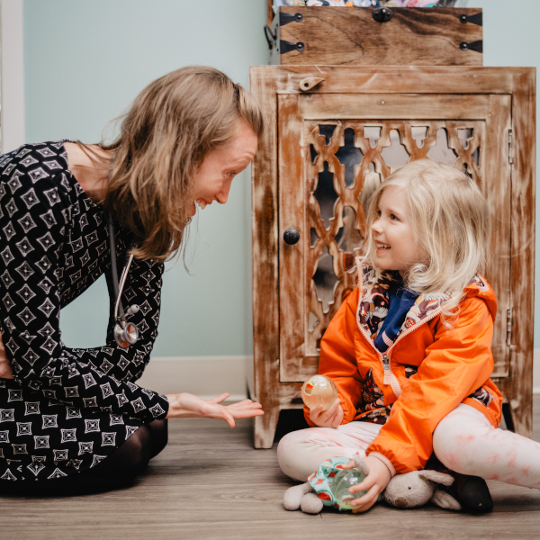 Naturopathic doctor with pediatric patient